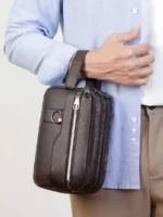 Men’s vintage-style handheld camera and phone storage bag