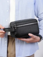 Men’s vintage-style handheld camera and phone storage bag