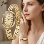 JW oval women's gold-tone quartz watch with chain-style strap