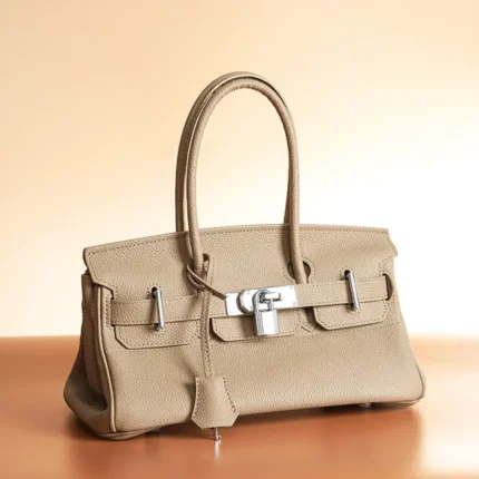 Women's top-grain cowhide handbag with silver buckle