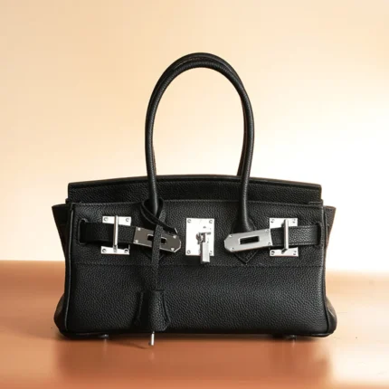 Women's top-grain cowhide handbag with silver buckle