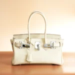 Women's top-grain cowhide handbag with silver buckle