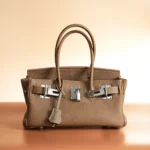 Women's top-grain cowhide handbag with silver buckle